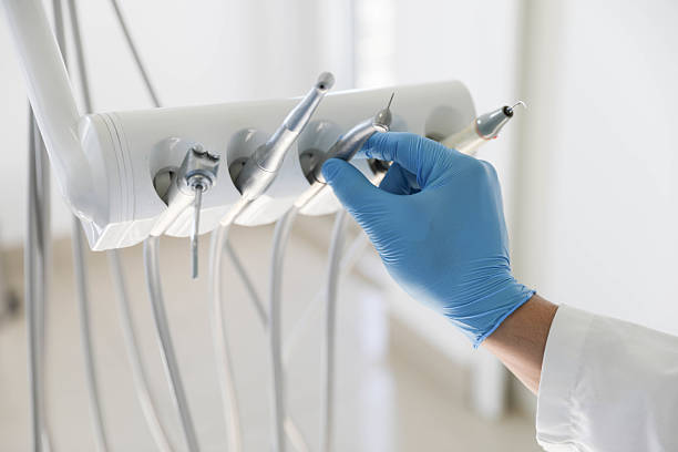 Professional Tooth Extraction technician working in Regency at Monroe, NJ